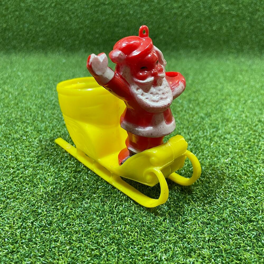 Vintage Rosbro Christmas Hard Plastic Santa in Yellow Sleigh Candy Container